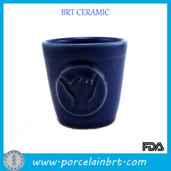 Light Blue Ceramic Embossed Finger Logo Juice Cup