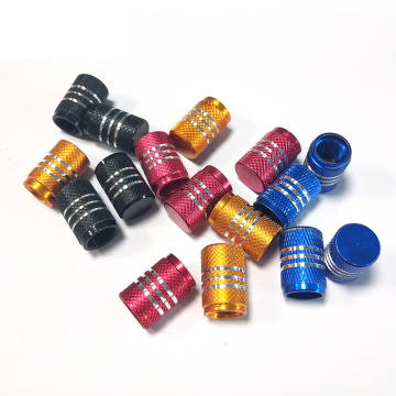 Tire valve stem caps with chrome stripes