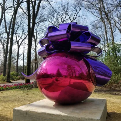 Large polished metal stainless steel Jeff Koons balloon sculpture