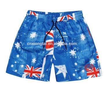 SWIMMING SHORTS FOR BOY WITH TRIANGLE NET MESH IN FLAGS MODEL