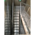 Formulario de concreto en escaleras de eje