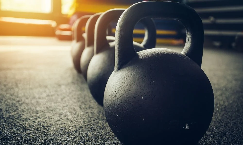 What are the benefits of using iron for gym weights and equipment