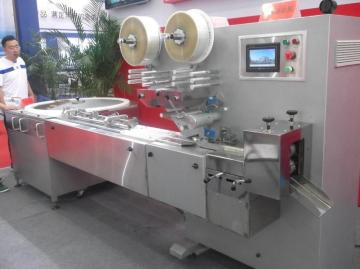 Automatically pillow packign machine with swash plate
