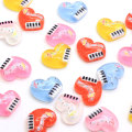 Παροχή Ποικιλία Χρώματα Ρητίνη Υπέροχη Καρδιά Σημειώσεις Πιάνο Επίπεδη Γοητεία DIY Craft Cabochons για Παιδικά Αξεσουάρ Λεύκωμα