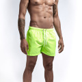 Shorts de natação masculinos verdes fluorescentes