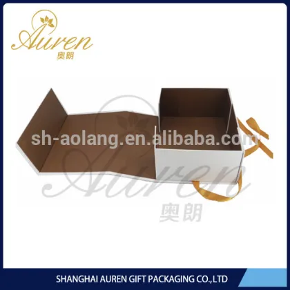 Plain white folding apparel boxes with ribbon