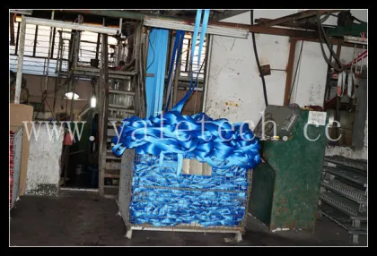 red flat web lifting sling in the power belt