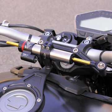 Dirección de la motocicleta estabilizar el soporte del soporte del amortiguador