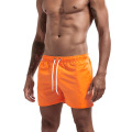 Shorts esportivos masculinos de laranja personalizados