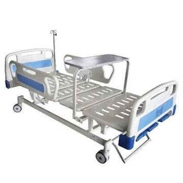 Cama manual de hospital con barandilla y respaldo