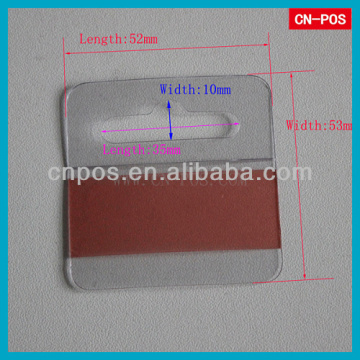 plastic adhesive hook packaging in supermarket