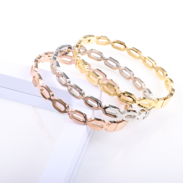 Gold plattiert Edelstahl Hohlarmband für Frauen - offenes Knoten Luxusdesign