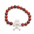 Red Jasper 8 MM cuentas redondas estiramiento pulsera de piedras preciosas con Diamante Skull Piece