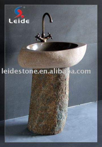 Cobble stone pedestal sink