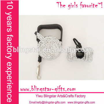 white rhinestone retractable dog leash with dog poop bag dispenser