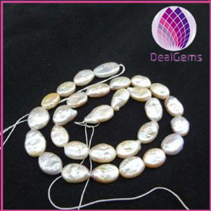Bead,baroque cultured freshwater pearl ,peach, 17x11mm-18x12mm flat oval, Mohs hardness 2-1/2 to 4. Sold per 15-inch strand.