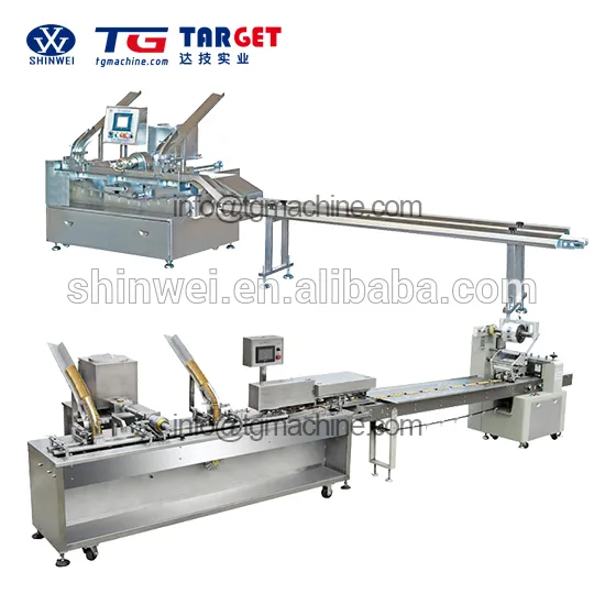 Biscuit sandwiching machine