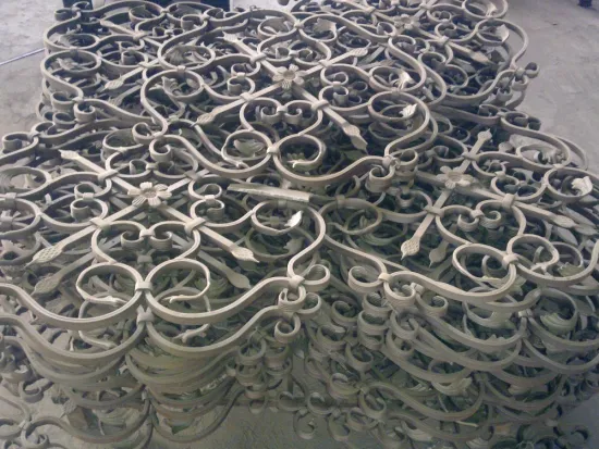 WROUGHT IRON RAILS OF GATE AND WINDOW