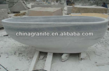 carved indoor bathtub
