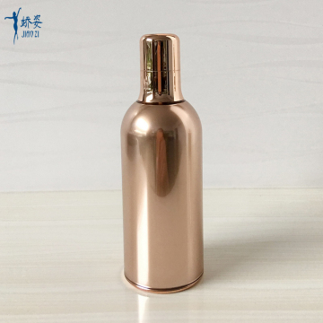 Butelka bezpowietrzna o pojemności 100 ml w kolorze różowego złota z pompką natryskową