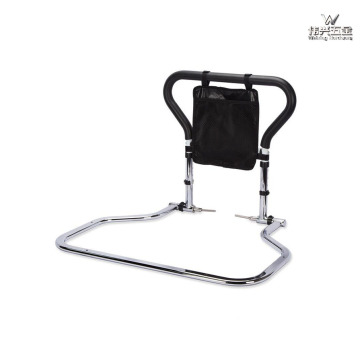 Foldable and reversible bedside armrest