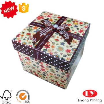 Cardboard ribbon gift packaging box with lid