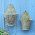 Wrought iron wall hanging painted feather iron bucket