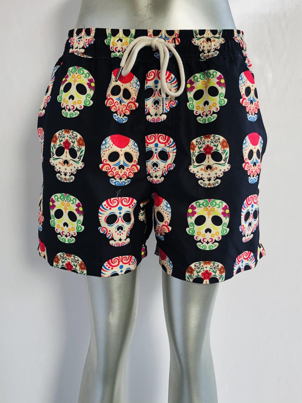 Black skull print men's beach shorts