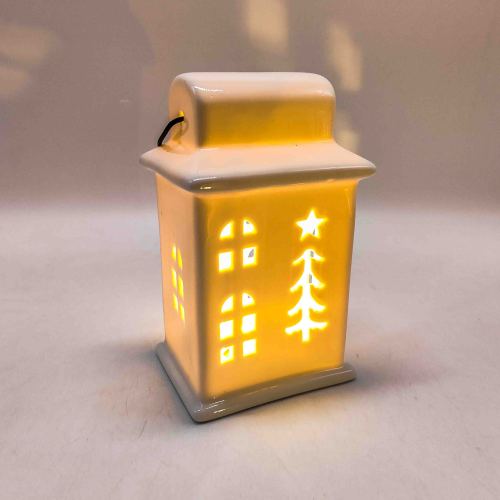 Lanterna de decoração LED de cerâmica oca em formato de casa