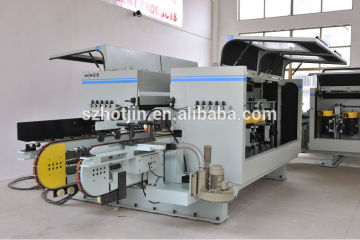 Longitudinal two-track double end tenoner