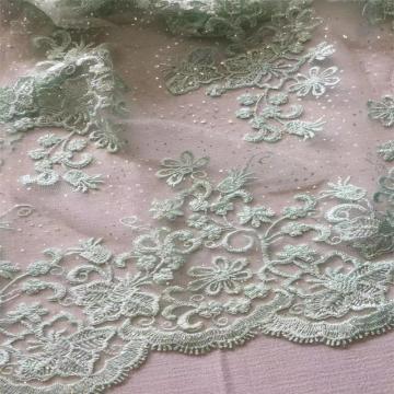 Tissu de broderie plat en tulle avec paillettes