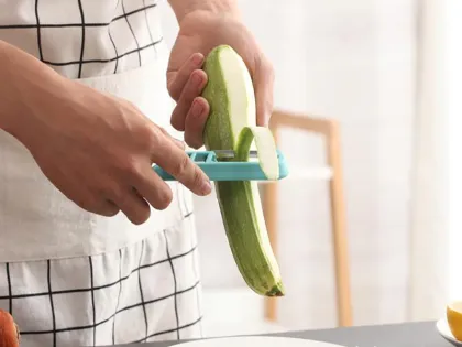 Multi-function Rotating Triangle Peeler Kitchen Fruit Planer