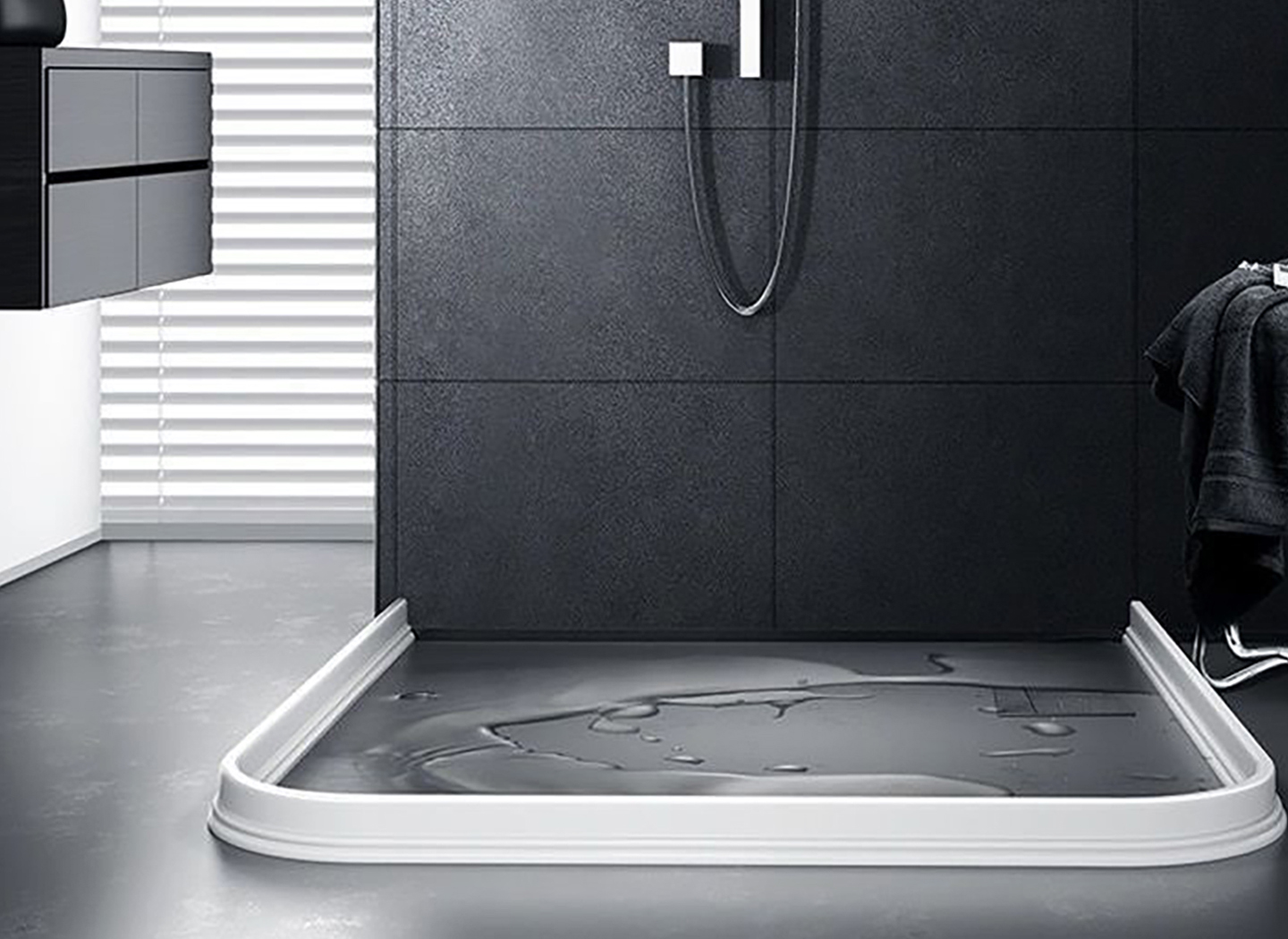 Shower water barrier strip