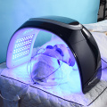 Máscara profesional de terapia de luz LED de 7 colores con spray hidratante, función UV, terapia de calor y EMS