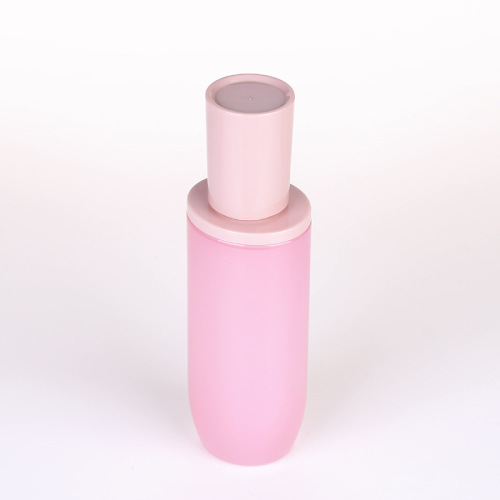 ピンクガラスガラス化粧品ボトルと瓶