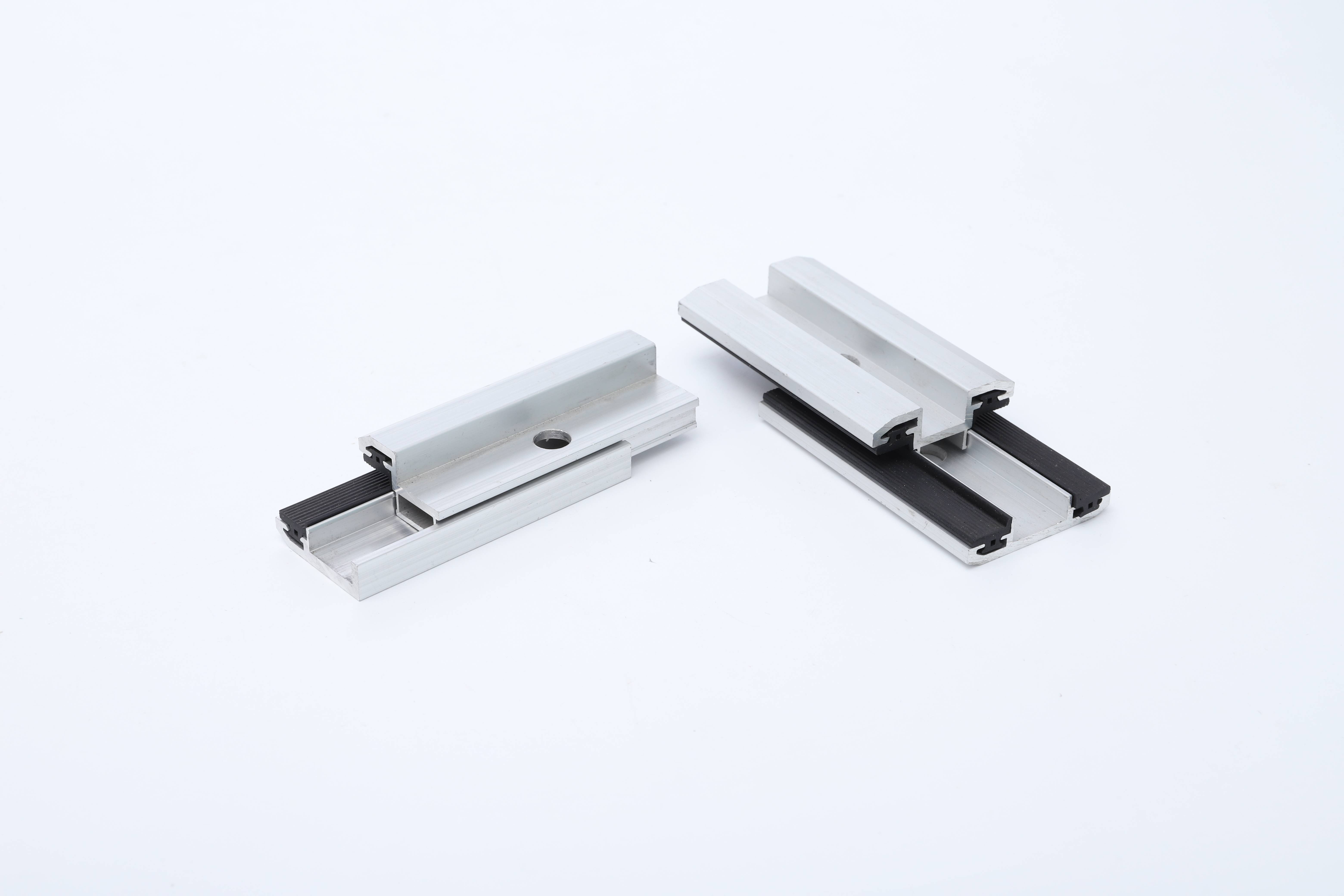 Aluminum alloy mid clamps for glass panels