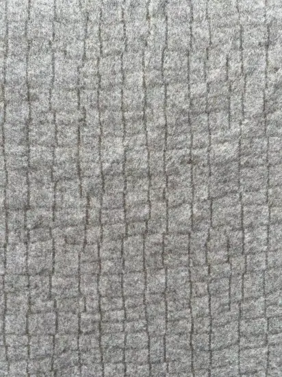 Knitted brushed wool fabrics with solid colours