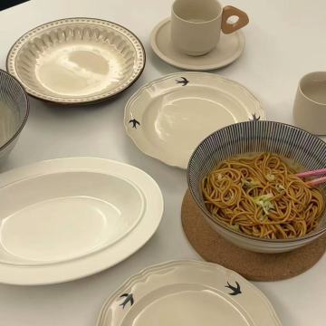 Elegant Ceramic Plates with Delicate Swallow Motifs