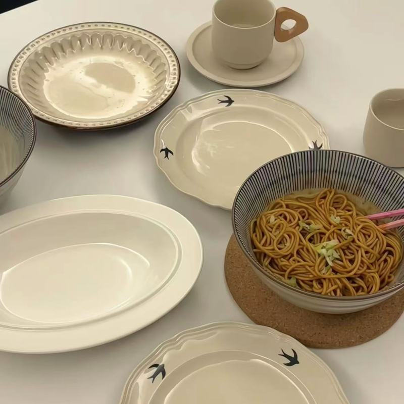 Elegant Ceramic Plates with Delicate Swallow Motifs