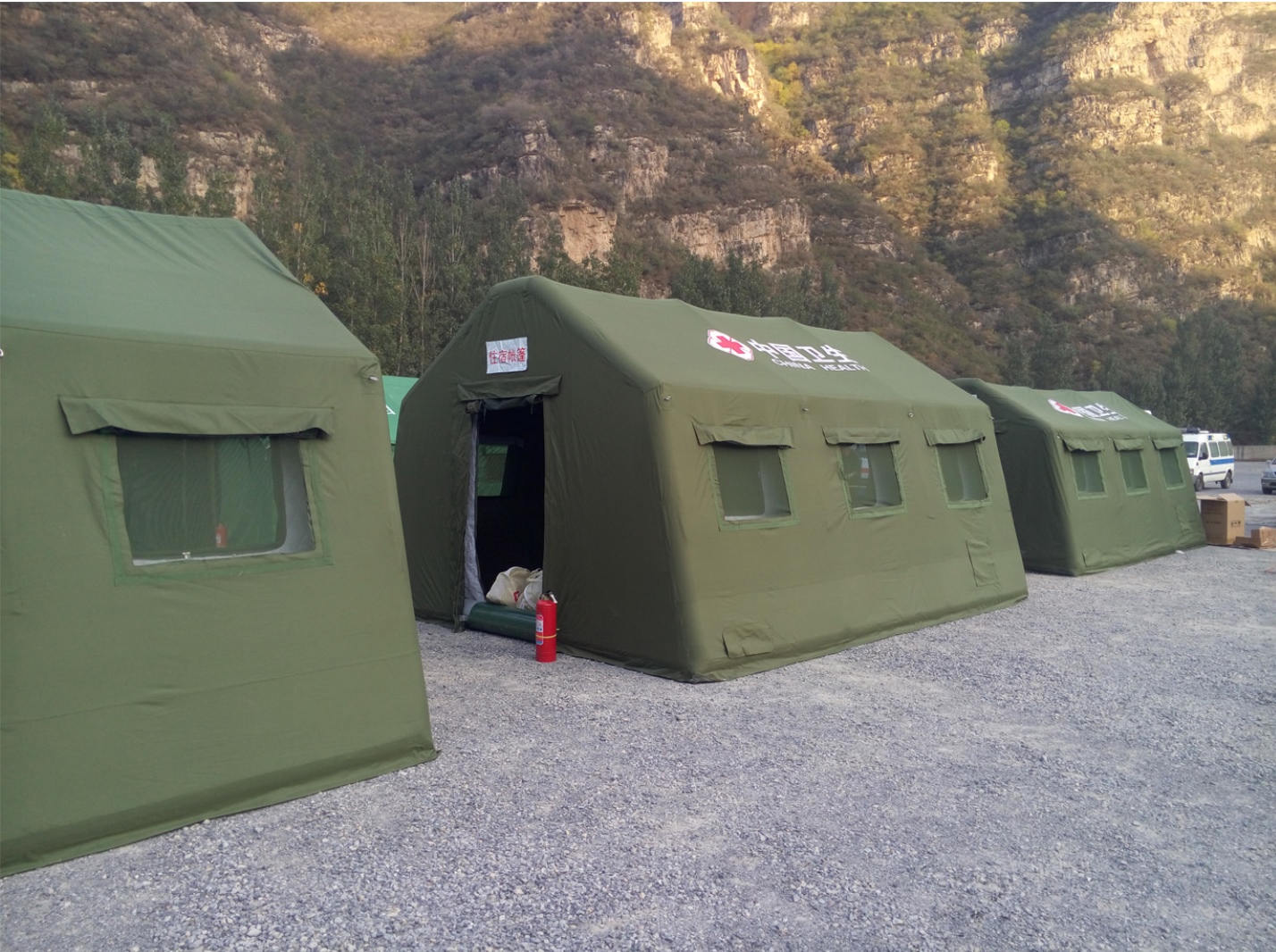 Interior of an inflatable camping tent with cots