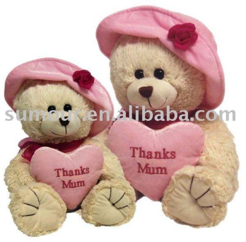 Hatted Stuffed Bear with a big pink heart & plush toys