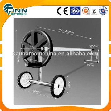 In-ground swimming pool cover roller and pool cover reel