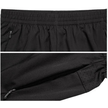 Pantalones cortos deportivos de tela tejida para hombre con cremallera