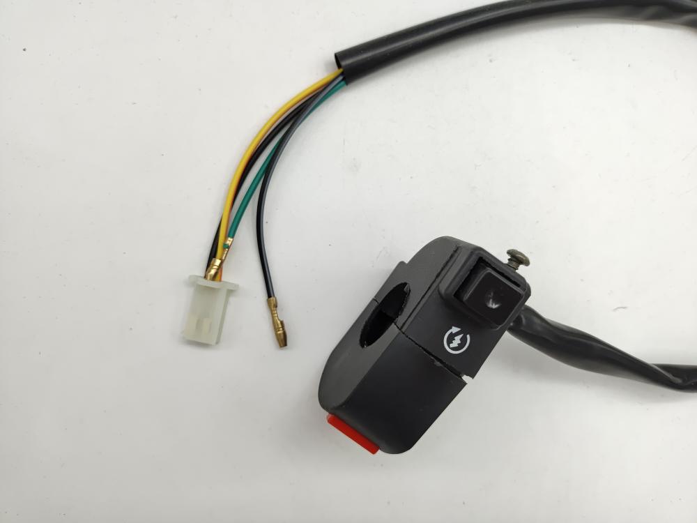Motorcycle button starts the power switch