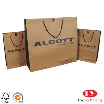 Flat handle brown twist kraft paper bag