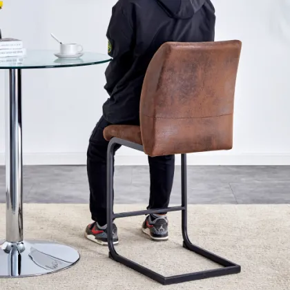 A set of two brown chairs