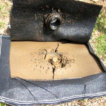 Geotextile Applications in Embankment Construction and Sludge Dewatering