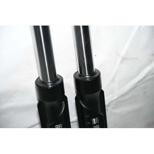 Amortecedor elétrico de três rodas