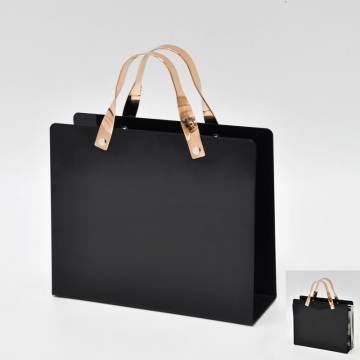 Bag shape handle hanging magazine rack