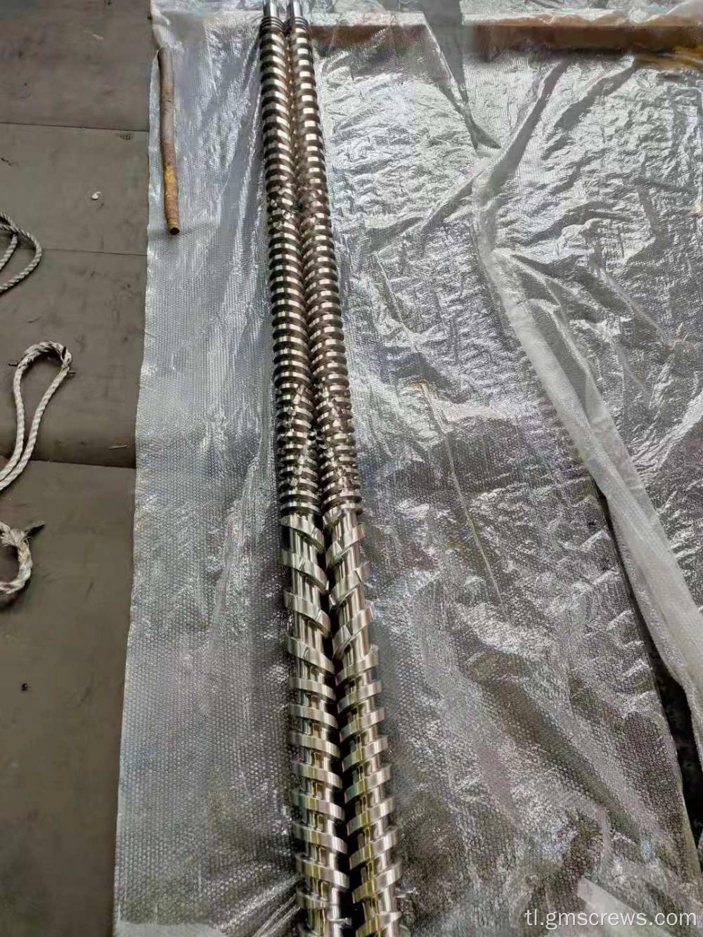 Twin bimetallic screw at bariles